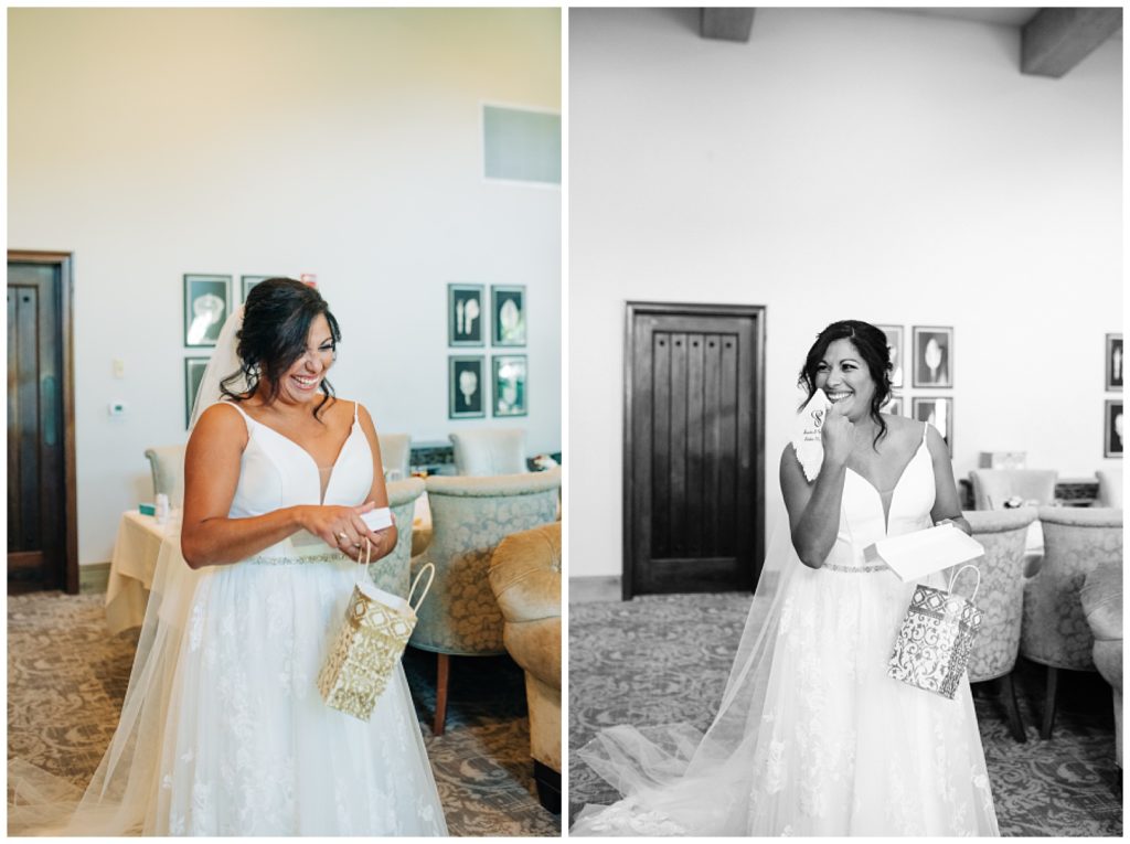 bride opening gift on her wedding day