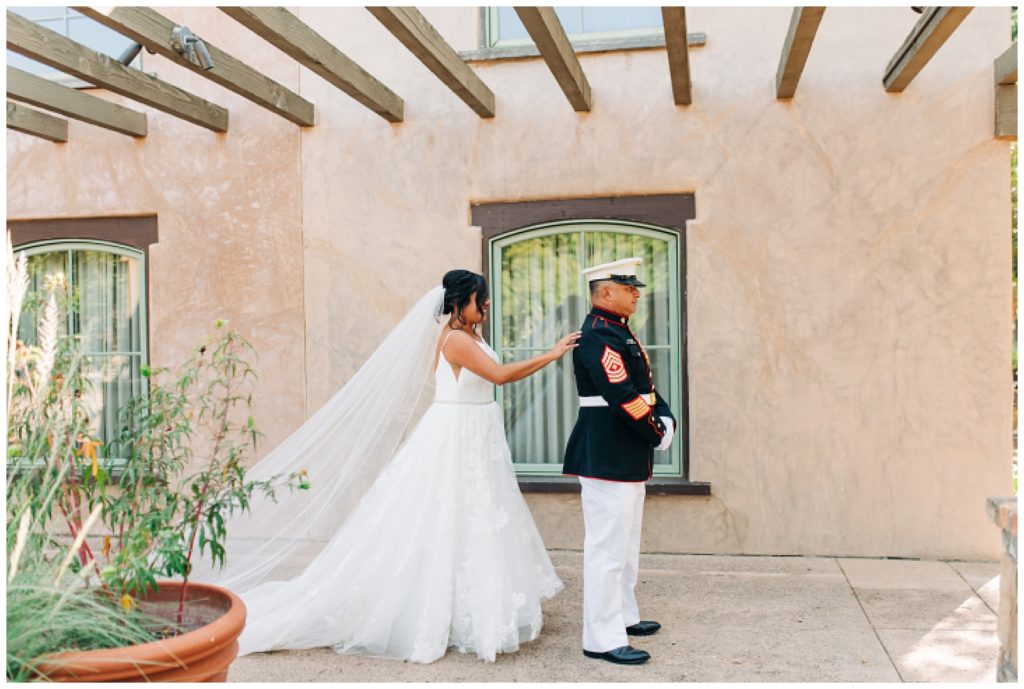bride and groom first look on wedding day at cimarron hills wedding venue