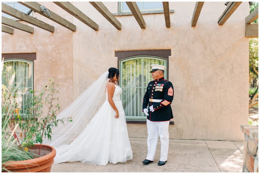 bride and groom first look on wedding day at cimarron hills wedding venue