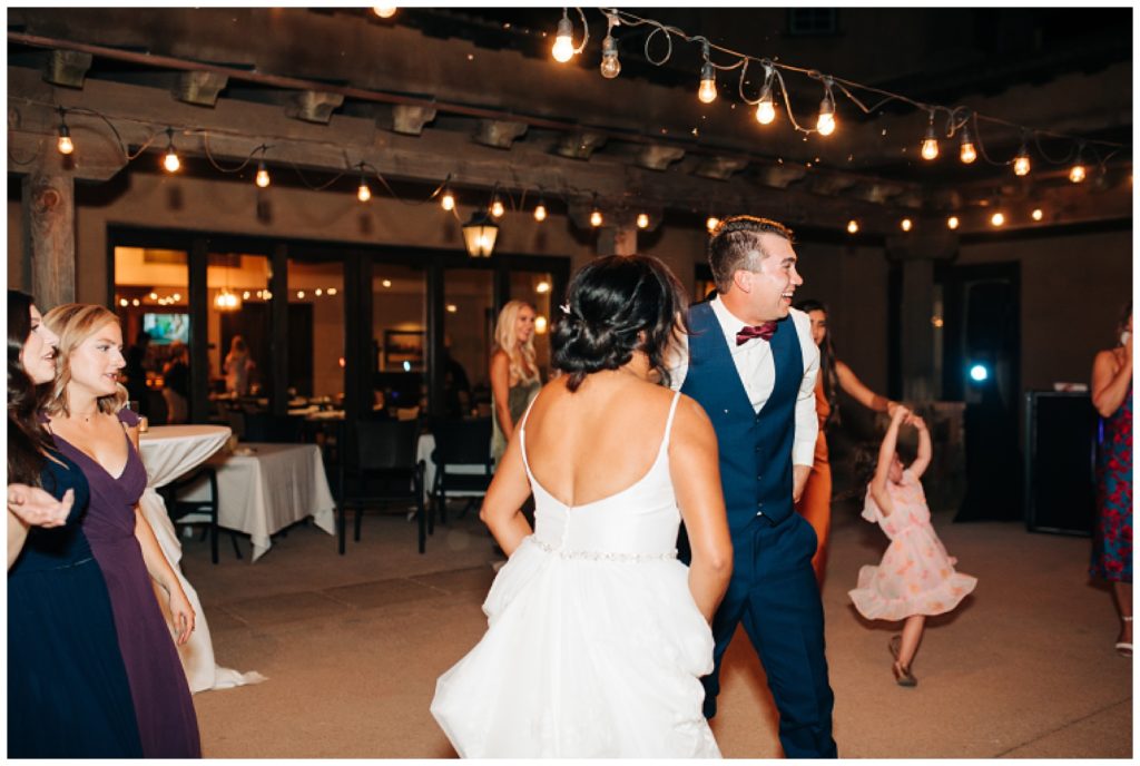 bride and groom dancing at wedding reception