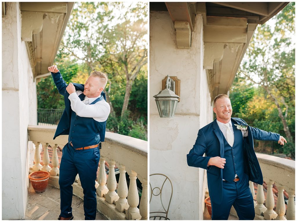 groom in navy suit getting ready on wedding day