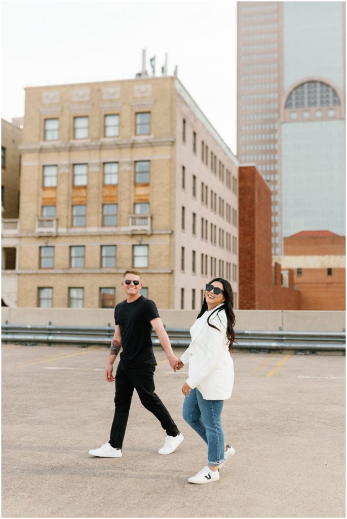 Engagement session in Downtown Dallas on a rooftop of a parking garage